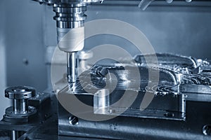 The CNC milling machine rough cutting the injection mold parts by indexable endmill tools.