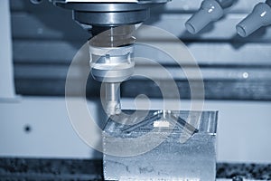 The CNC milling machine rough cutting  the injection mold parts by indexable  endmill tools.