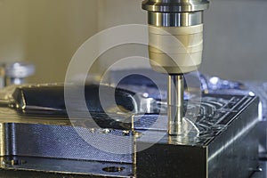 The CNC milling machine rough cutting the injection mold parts by indexable tools