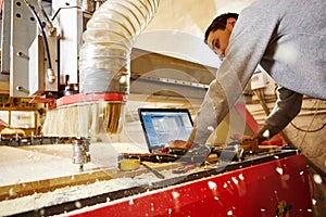 CNC router machine creates a layout of the shelf complex.