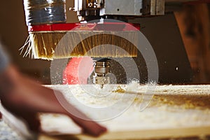 CNC router machine creates a layout of the shelf complex.