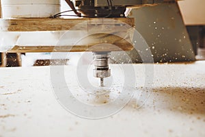CNC router machine creates a layout of the shelf complex.