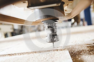 CNC router machine creates a layout of the shelf complex.