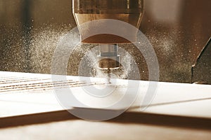 CNC router machine creates a layout of the shelf complex.