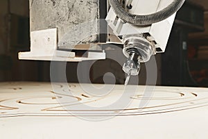 CNC router machine creates a layout of the shelf complex.