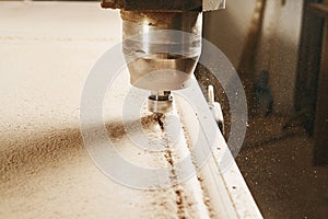 CNC router machine creates a layout of the shelf complex.