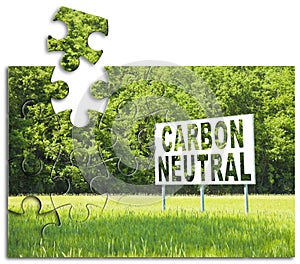 CO2 Carbon Neutral concept against an advertising billboard immersed in nature - solutions concept in jigsaw puzzle shape photo