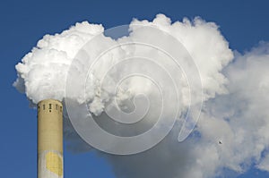 CO2 Emissions from flue pipe of coal power plant photo