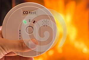 Carbon monoxide alarm in the air for rooms heated by stoves and fireplaces photo