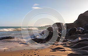 Co Thach Rock beach with wave in the sunlight morning