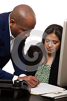 Co-Worker Explaining Something to Team Mate