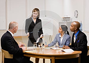 Co-workers having meeting in conference room