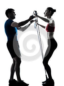 Coach man woman exercising gymstick silhouette