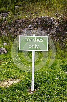 Coach only parking sign