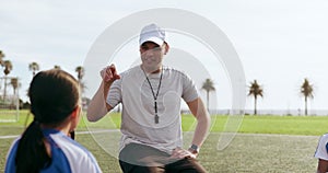 Coach, question and children on field for soccer for game, match and practice outdoors together. Sports, teamwork and