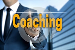 Coaching touchscreen is operated by businessman