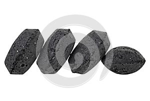 Coal briquette for BBQ isolated on white background
