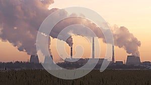 Coal burning power plant with smoke stacks