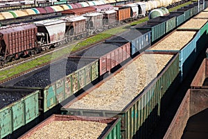 Coal cars, wood chips and sawdust on the train. Global warming. Energy production