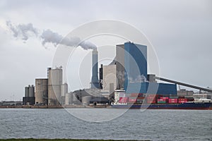 The coal energy power plant of Engie with steam coming out of the chimney.