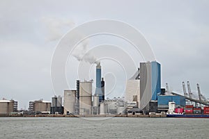 The coal energy power plant of Engie with steam coming out of the chimney.