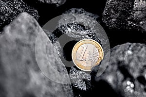 Coal and euro coin