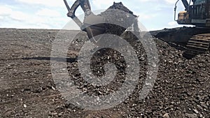 Coal extraction with heavy equipment