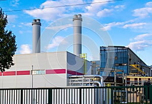 Coal-fired power plant with chimneys