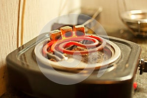 Coal for hookah warm-up on the grill