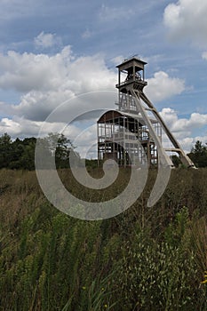 For coal mine elevators under a dramatic sky near Maasmechelen Village