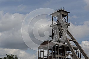 For coal mine elevators under a dramatic sky near Maasmechelen Village