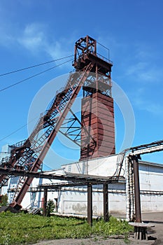Coal mine tower on blue sky