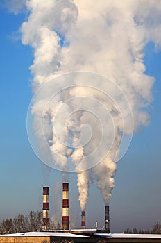 Coal plant smoke stacks.