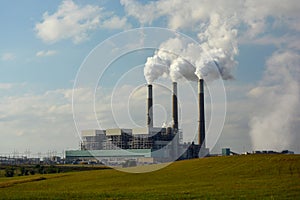 Coal Power Plant with Carbon Dioxide Coming from Smokestacks.