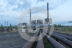 Coal power plant with high chimneys industry landscape.