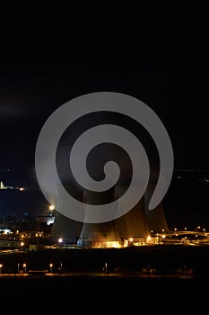 Coal power plant in night, Smoke towers