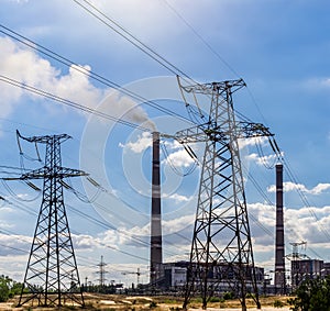 Coal power plant pollution and power lines.