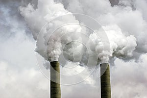 Coal Power Plant Smokestacks Emitting Pollution into Atmosphere