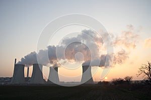 Coal power plant at sunset