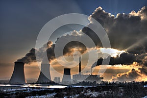 Coal powerplant view - chimneys and fumes photo