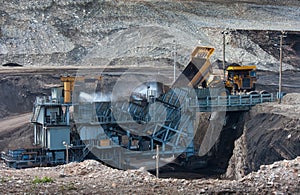 Coal-preparation plant. Big mining truck at work site coal tran