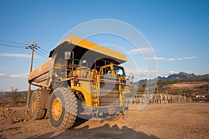 coal-preparation plant. Big yellow mining truck at work site coal transportation