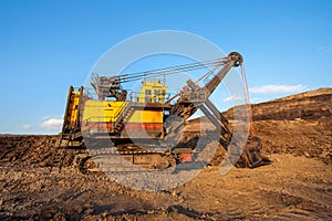 coal-preparation plant. Big yellow mining truck at work site coal transportation