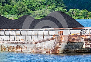 Coal Sitting in Barge Waiting For Shipment