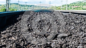 Coal transported by train. Photo taken from above the wagon. coal is transported to power plants