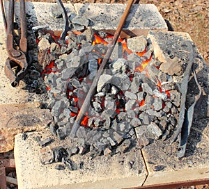 Coals and blacksmith tools