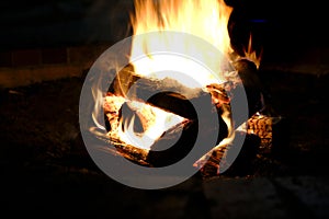 Coals Glowing with Fire in Firepit for Camping and Gathering