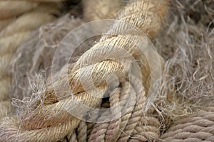 Coarse rope made from stems of natural hemp photo