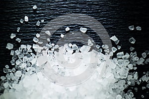 Coarse salt on a dark background