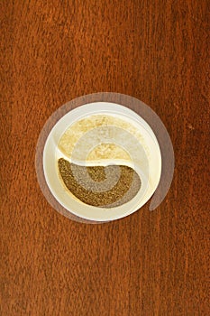 Coarse Salt and Ground Pepper in Ying and Yang small saucer